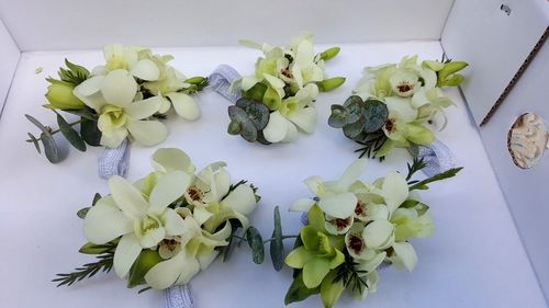 Wrist Corsages with White Orchids