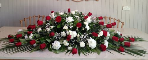 Red and White Casket Flowers