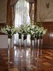 Tall Vase Arrangements with White Orchids and Twisted Willow