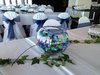 Guest Table Arrangements with Blue Orchids and Ivy