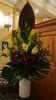 Palm Pod with Yellow Lily and Purple Orchid Corporate Reception Flowers