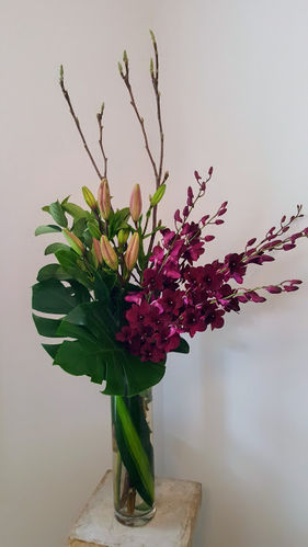 Lily, Orchid and Mosteria Corporate Reception Arrangement