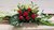 Columbian Red Rose Palm Pod with White Orchids and Lily Corporate Reception Arrangement